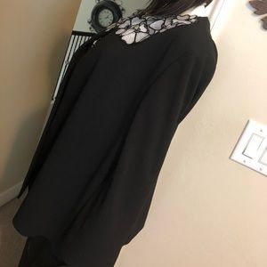 Update your look for the upcoming season in a black and white jacket!